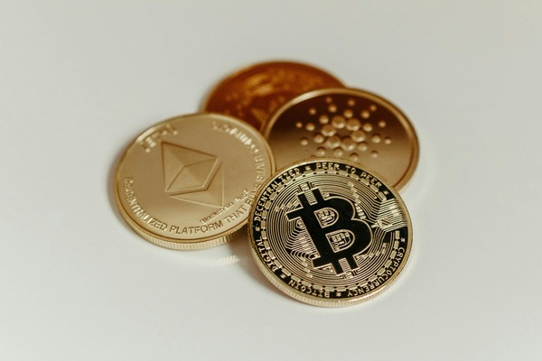 Gold Ethereum, Cardano and Bitcoin coins